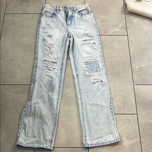 Women’s Kan Kan high rise, wide leg jeans. Light wash and with distressing